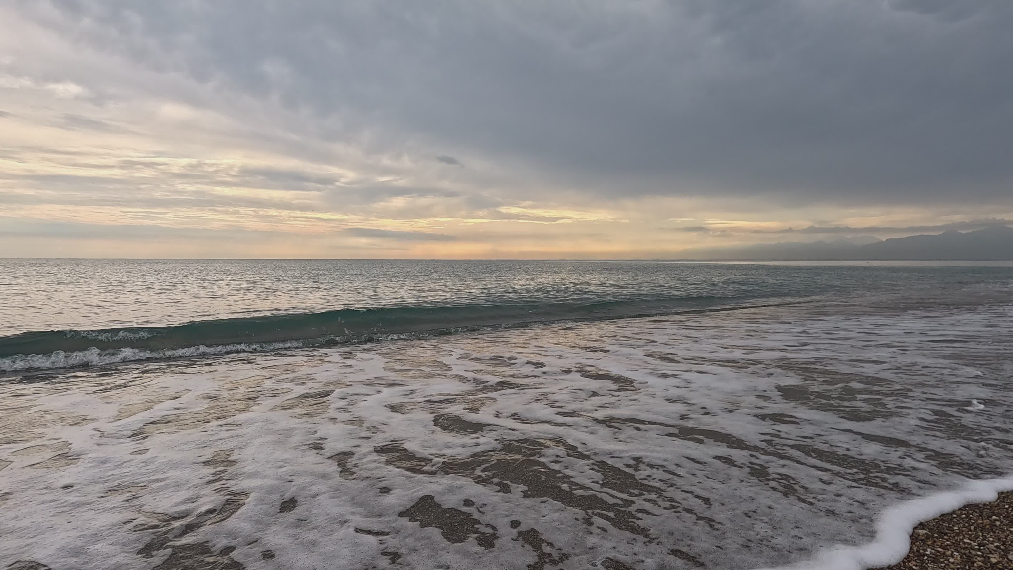 Serene Coastal Sunset with Gentle Waves Free Stock Video Footage ...
