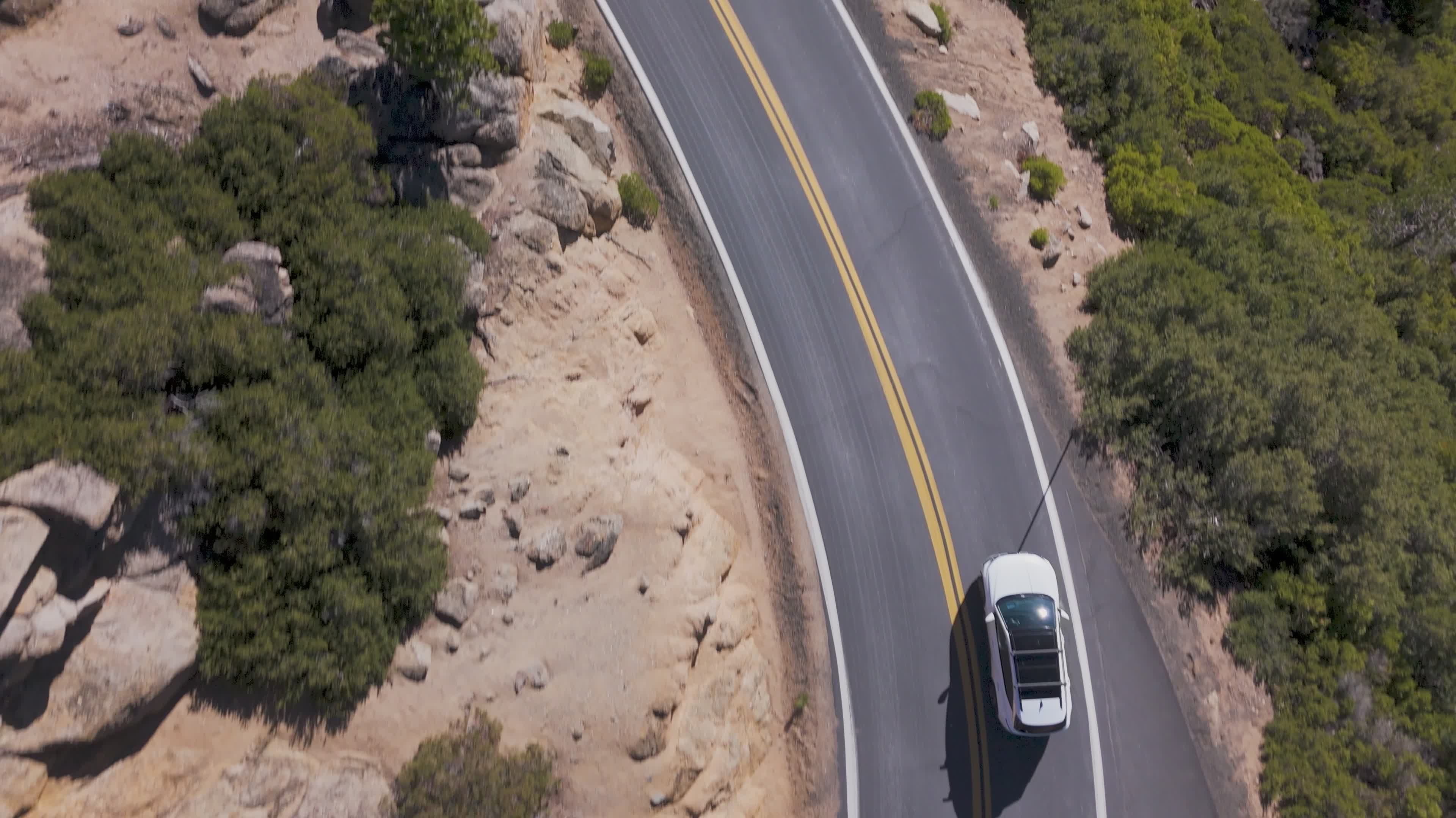 Aerial view of car on winding mountain road Free Stock Video Footage ...
