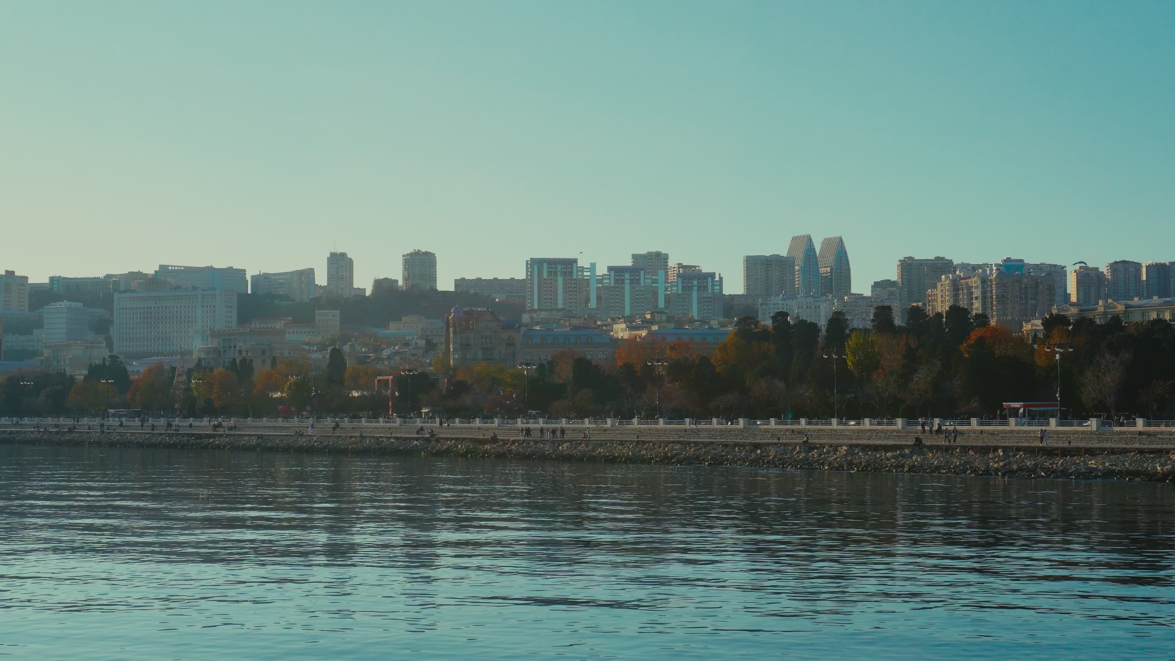 Scenic Urban Skyline Along Peaceful Waterfront Free Stock Video Footage ...