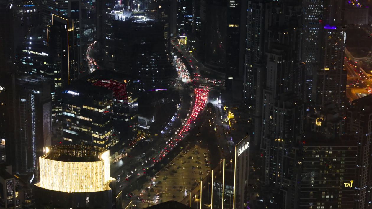 Aerial View of Vibrant City Skyline at Night Free Stock Video Footage ...