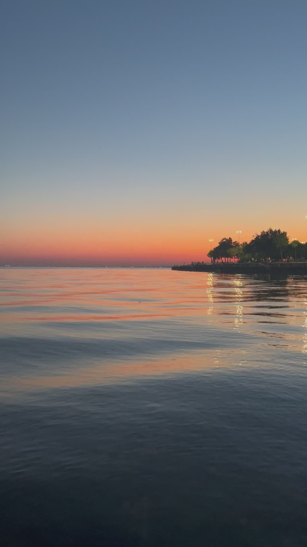 Serene Coastal Sunset Over Calm Ocean Waters Free Stock Video Footage ...