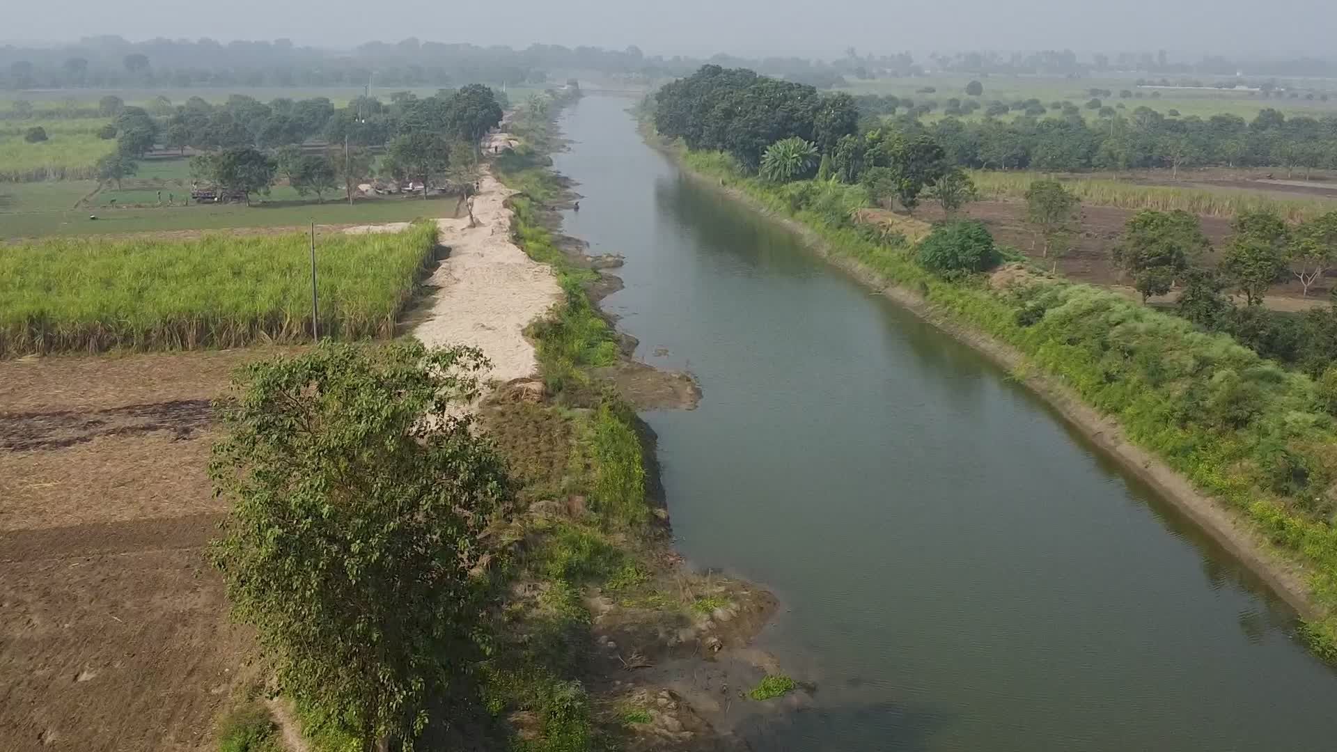Serene Aerial View of Rural Farmland and River Free Stock Video Footage ...