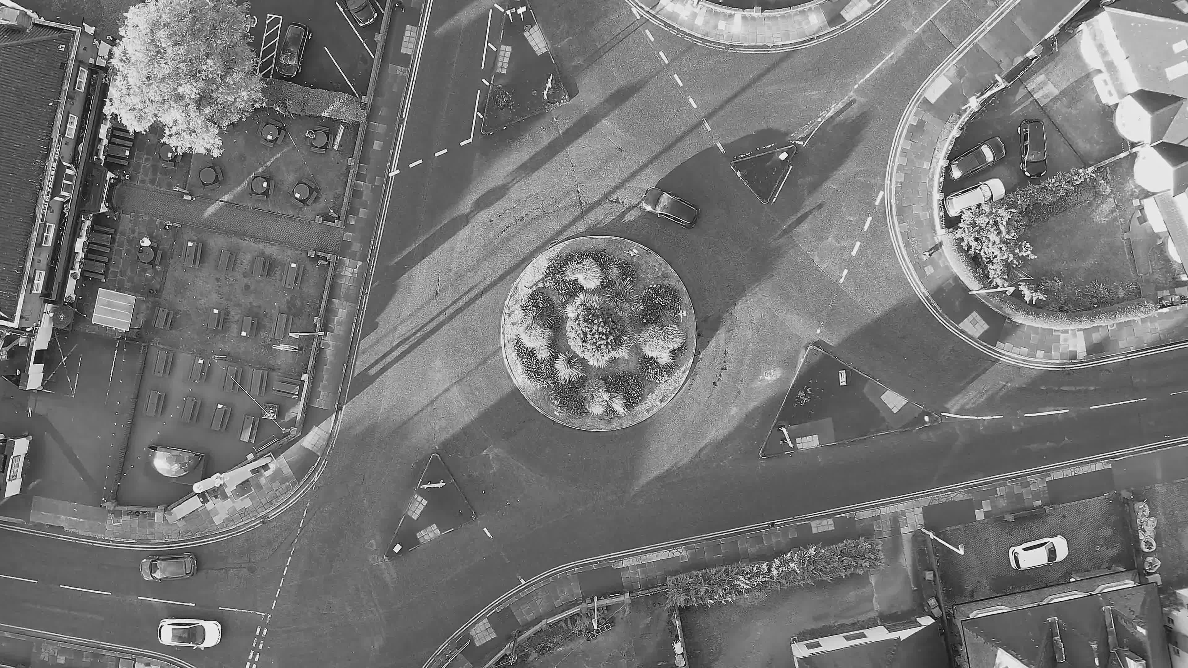 Aerial View of Bustling Traffic Roundabout Free Stock Video Footage ...