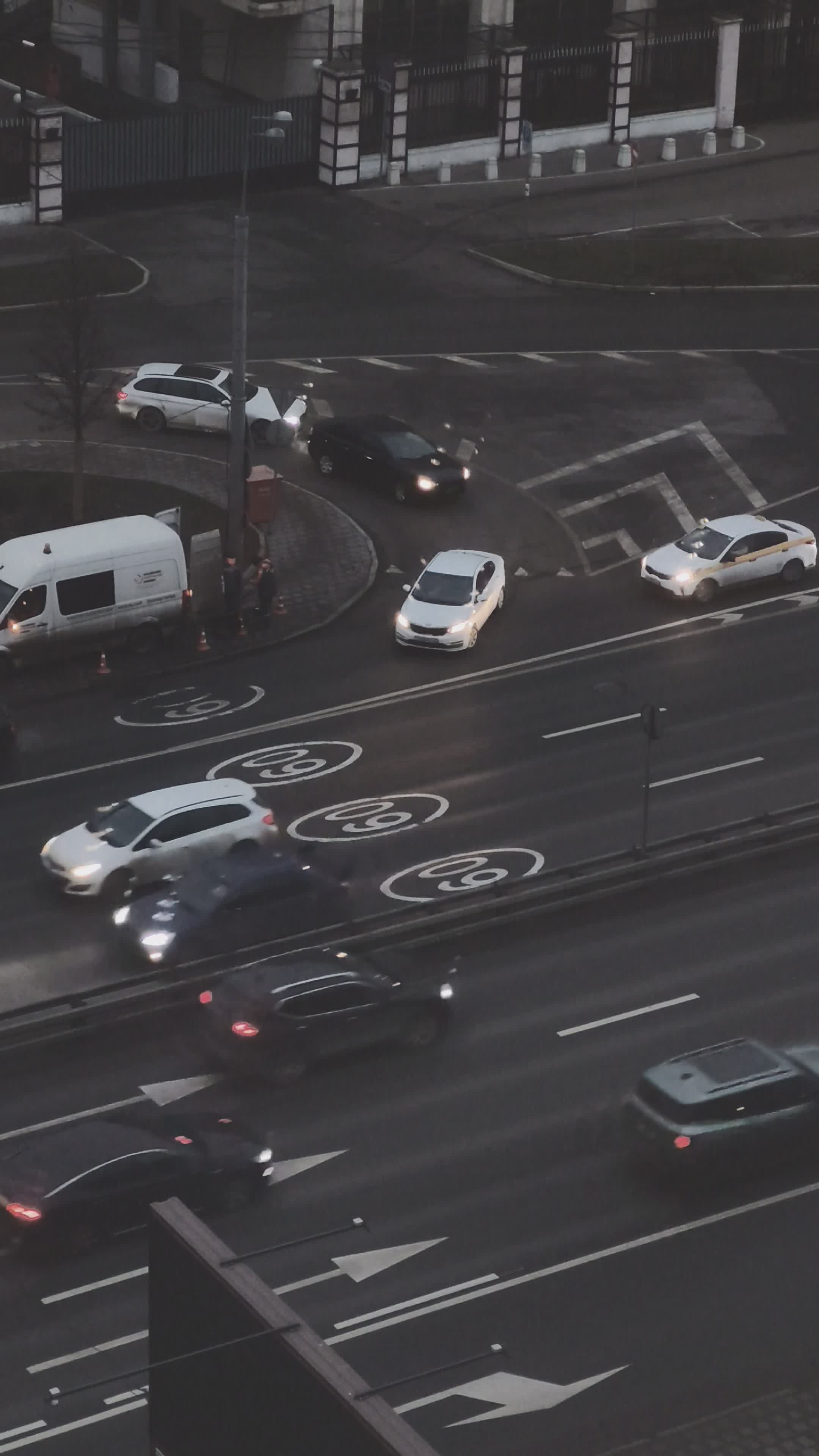 busy urban intersection with flowing traffic 35359810