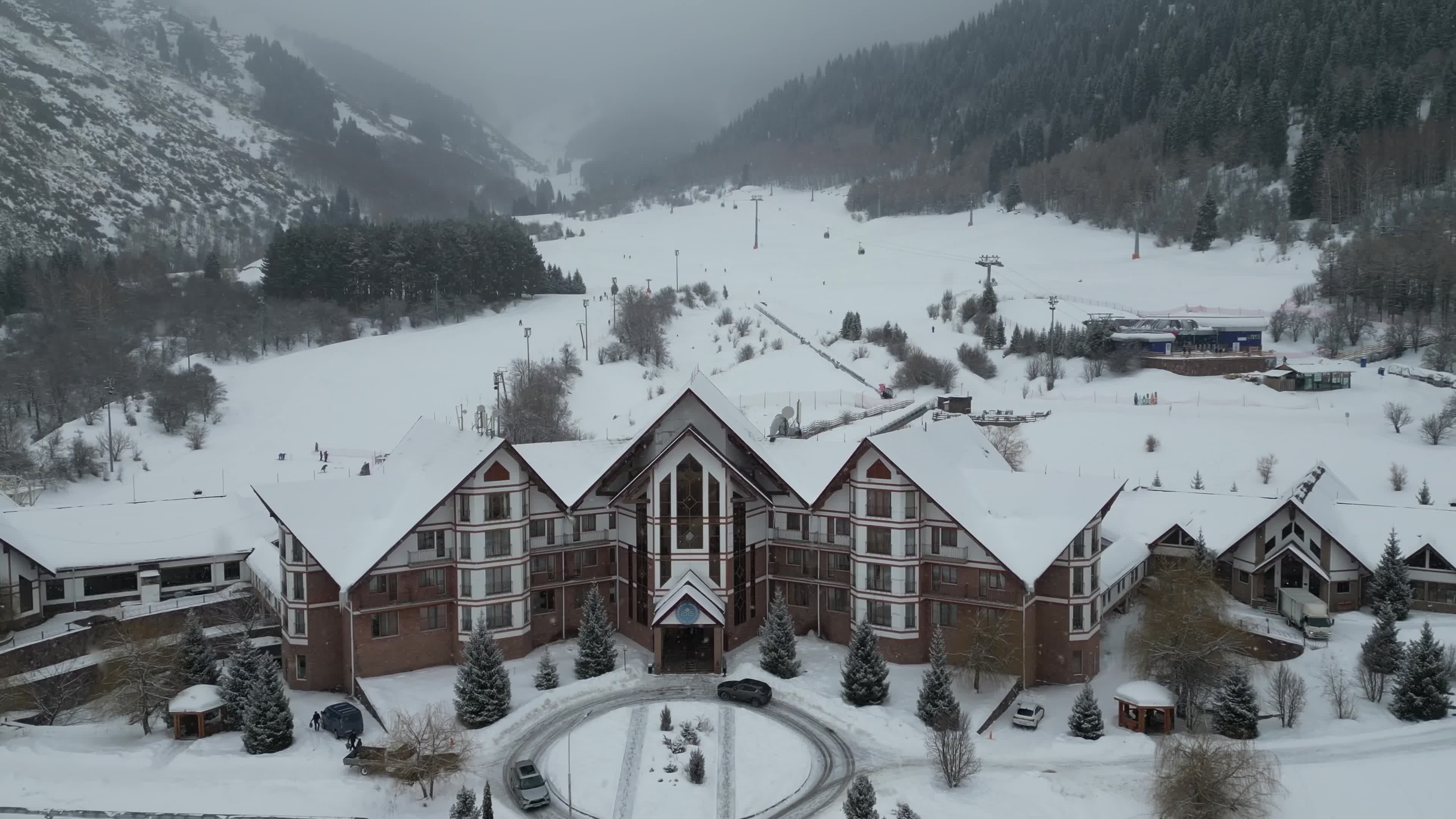 Aerial View of Snowy Mountain Lodge Resort Free Stock Video Footage ...