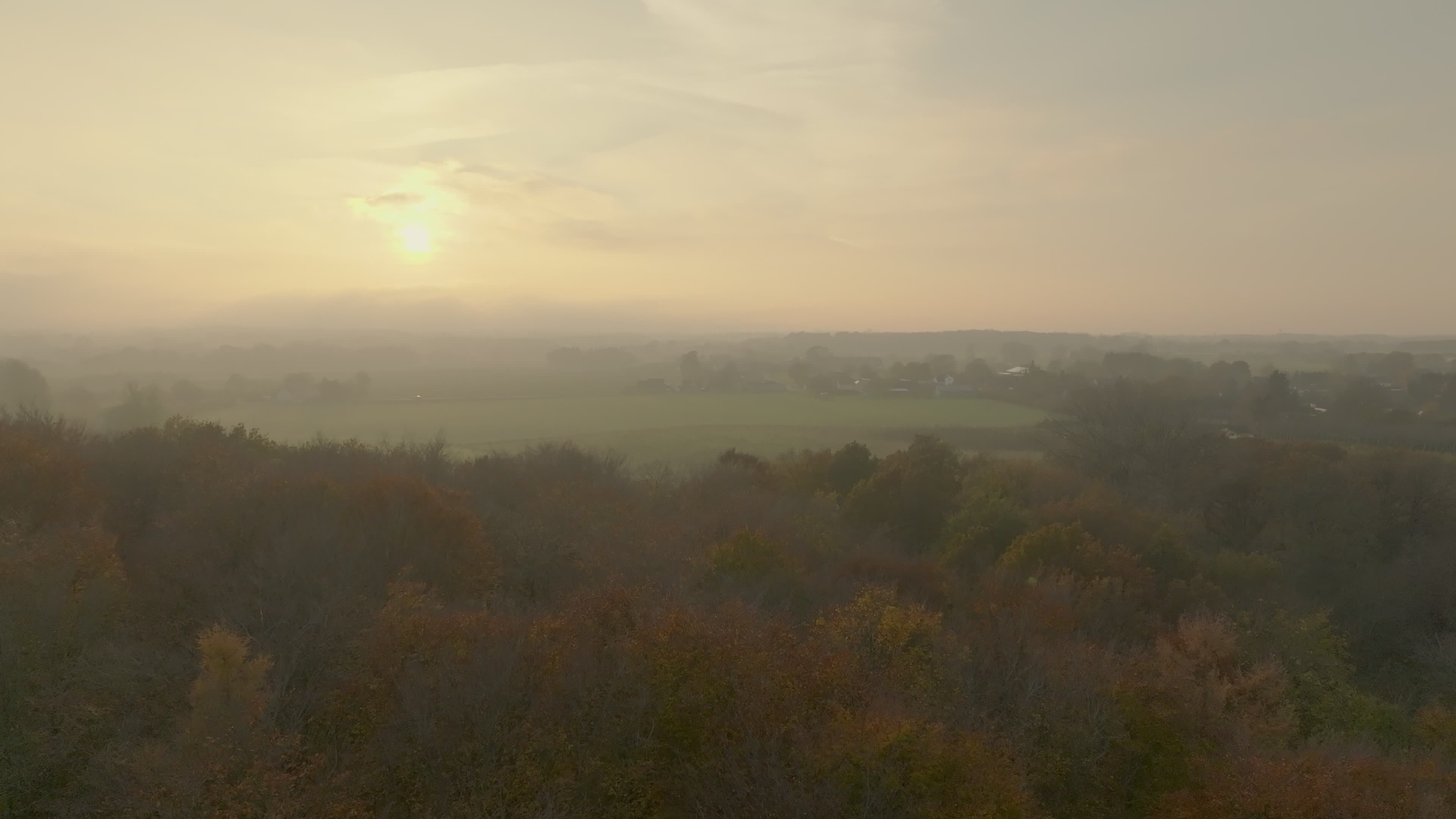 Serene Aerial View of Misty Countryside at Sunrise Free Stock Video ...