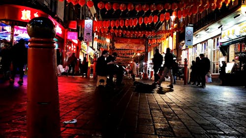 Musician Are Performing On The Street Of A Chinatown In London