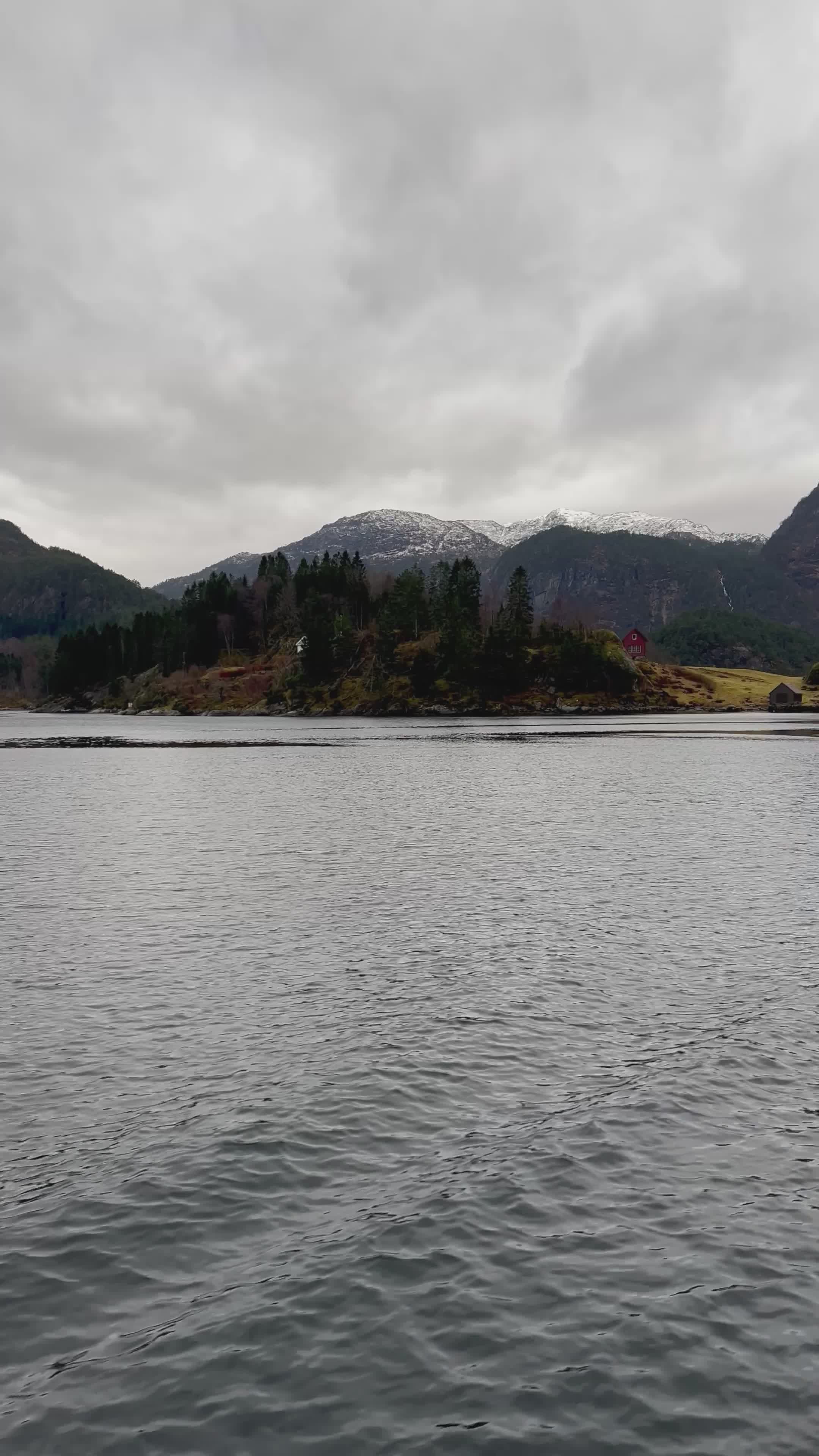 Tranquil Mountain Lake Scene with Overcast Sky Free Stock Video Footage ...