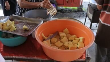 street food preparation of tofu and potatoes