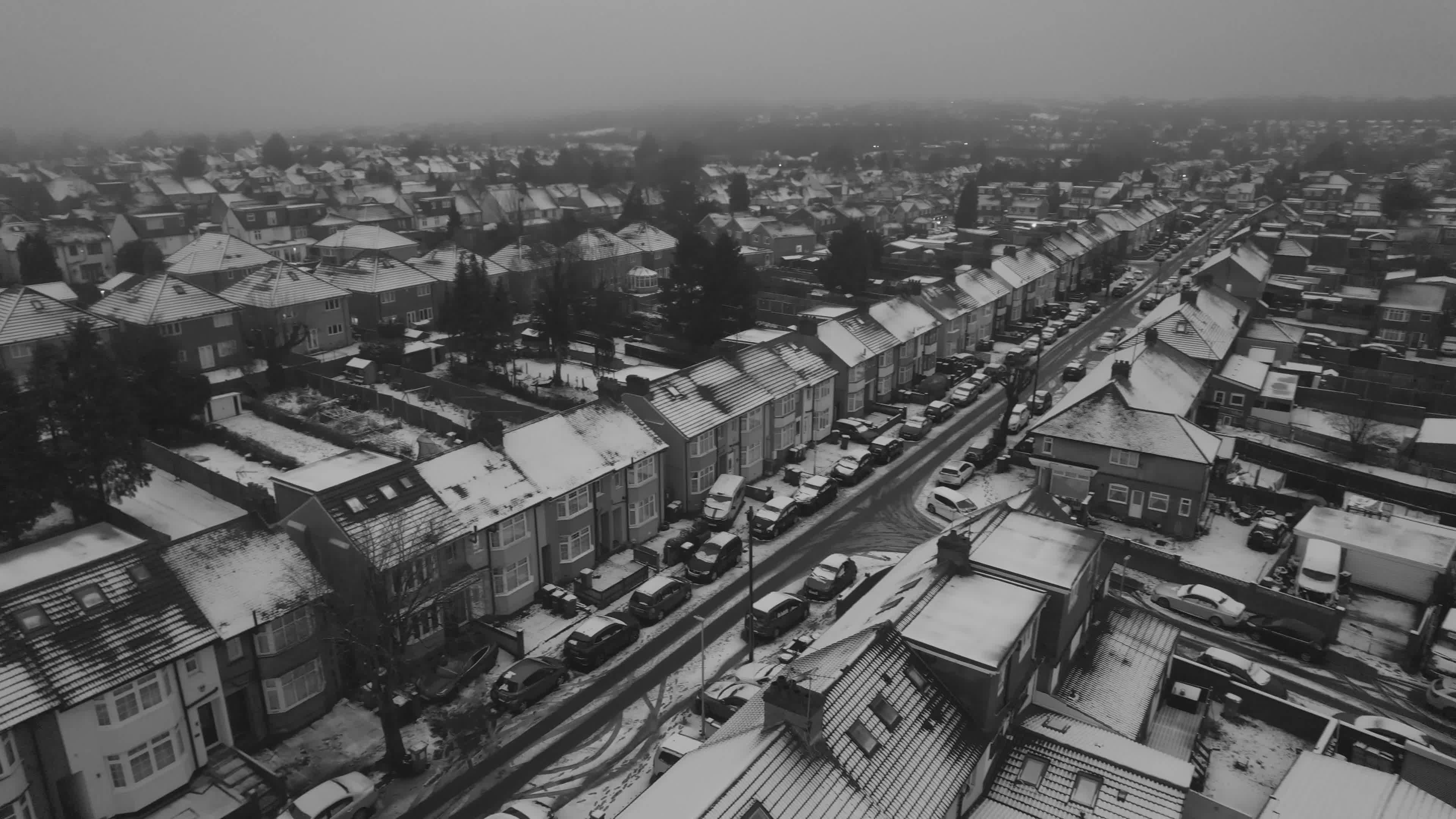 aerial view of snowy residential street in winter 35453527