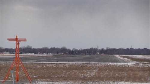 An Airplane Landing On The Runway