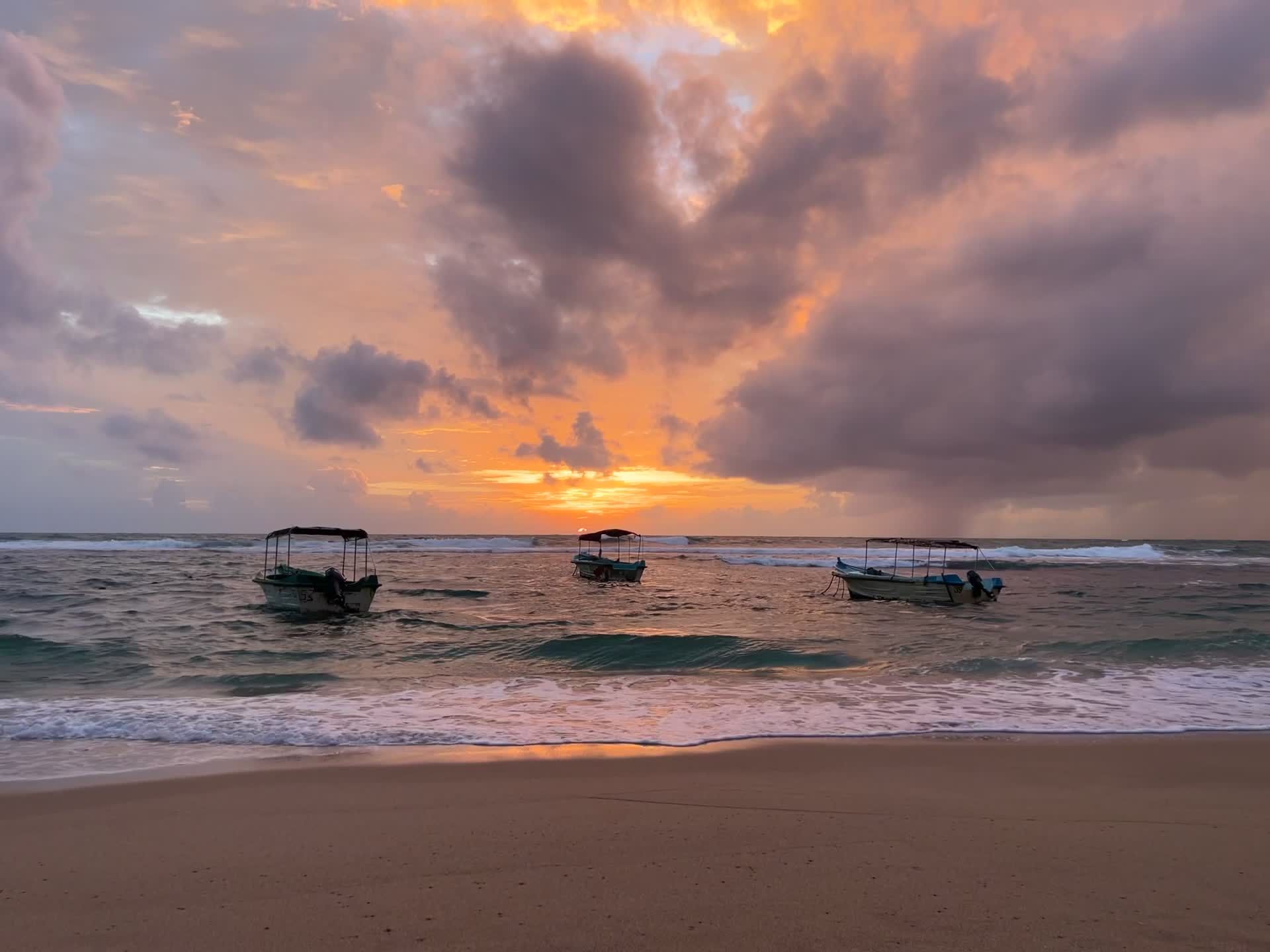 Vibrant Sunset Over Tropical Beach with Boats Free Stock Video Footage ...