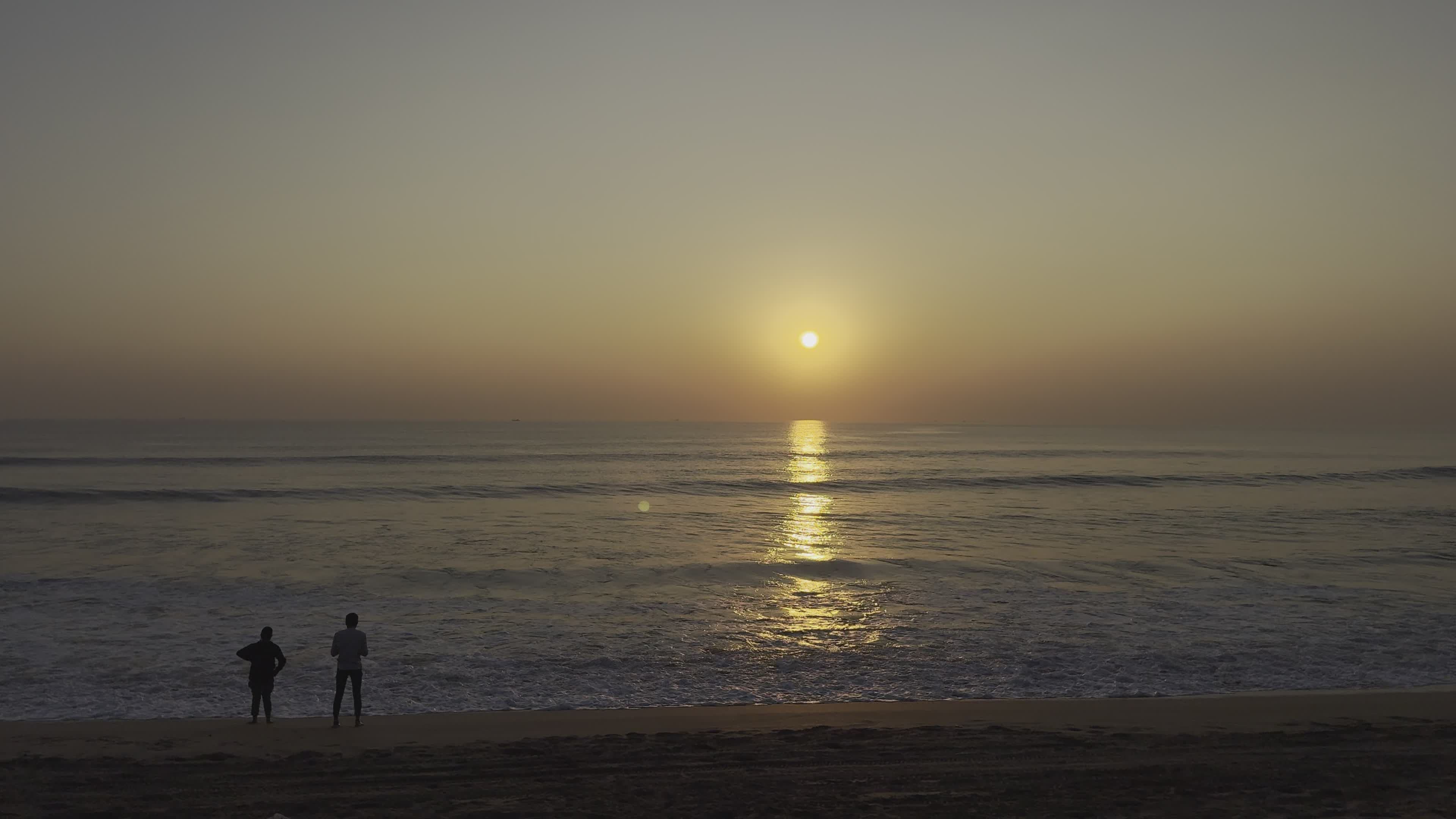Scenic Beach Sunset with Two People Viewing Free Stock Video Footage ...
