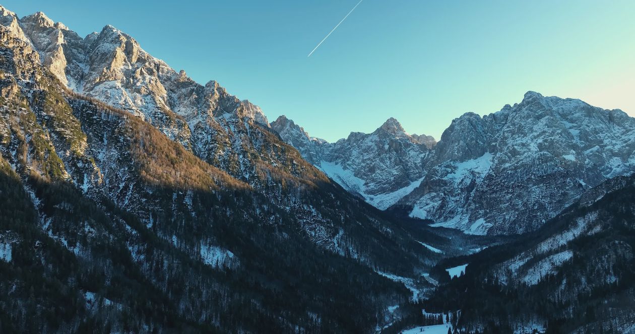 Aerial View of Snowy Mountain Range at Sunrise Free Stock Video Footage ...