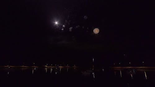 Fireworks Display At Night Brightening Up The Dark Sky