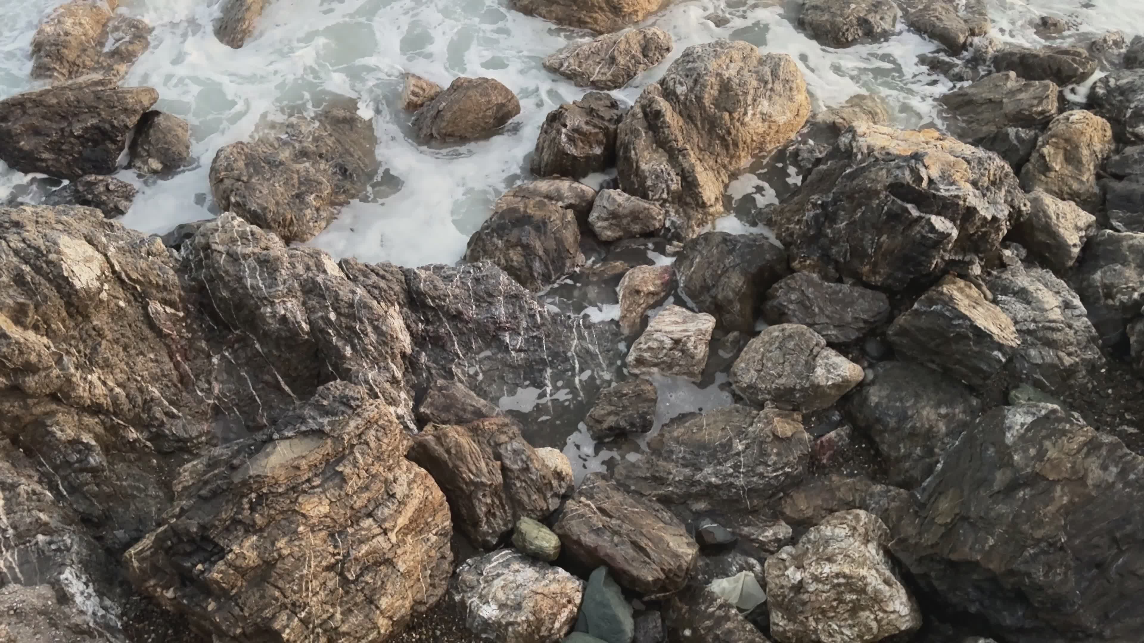 Waves Crashing on Rocky Shore at Sunset Free Stock Video Footage ...