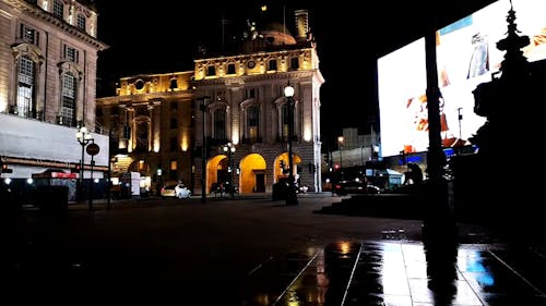 Giant Screen Of An Electronic Billboard Lighting Up A Street