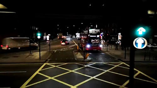 Motor Vehicles Traffic On A London Road At Night