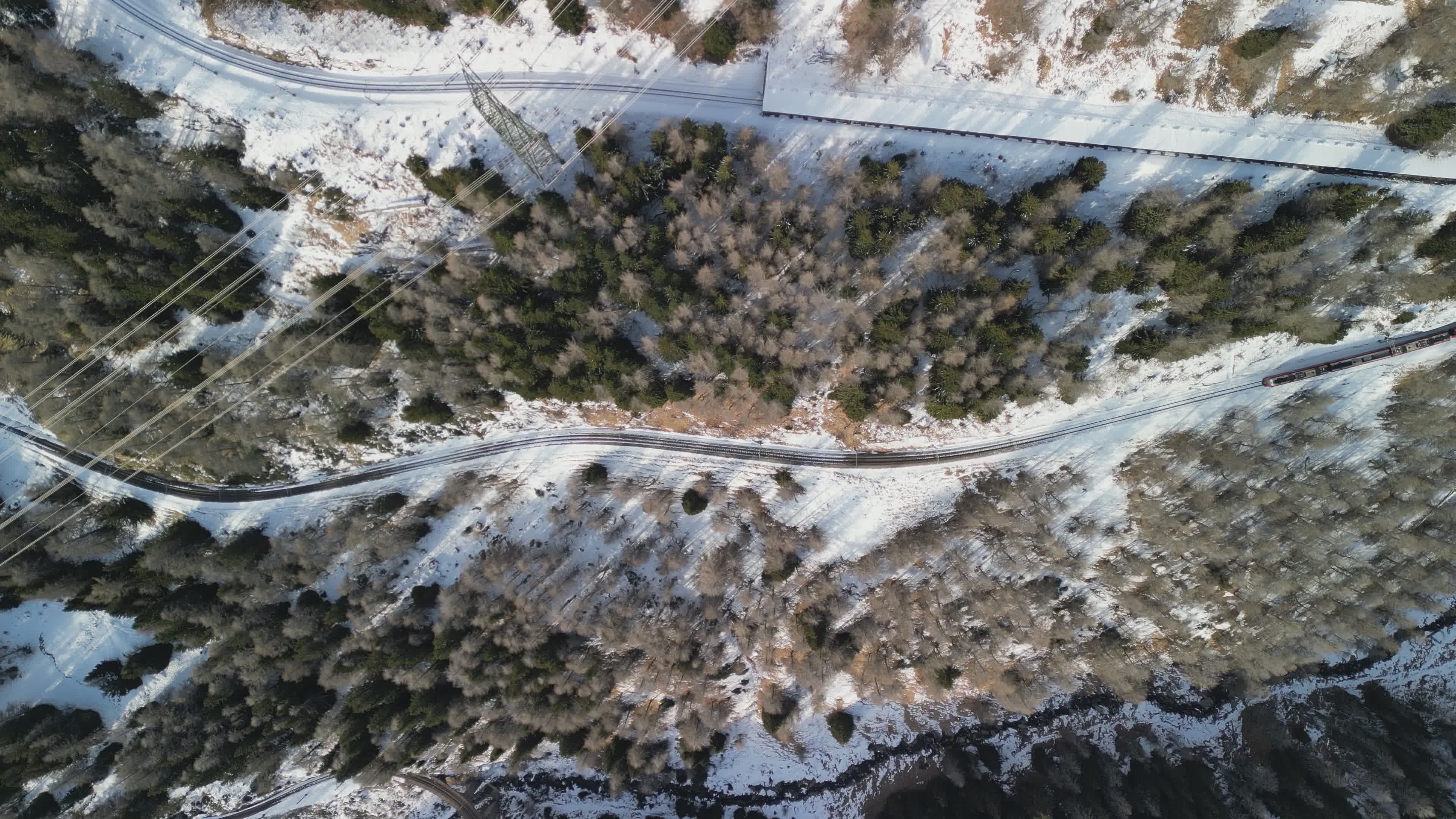 Aerial View of Snowy Mountain Road in Winter Free Stock Video Footage ...