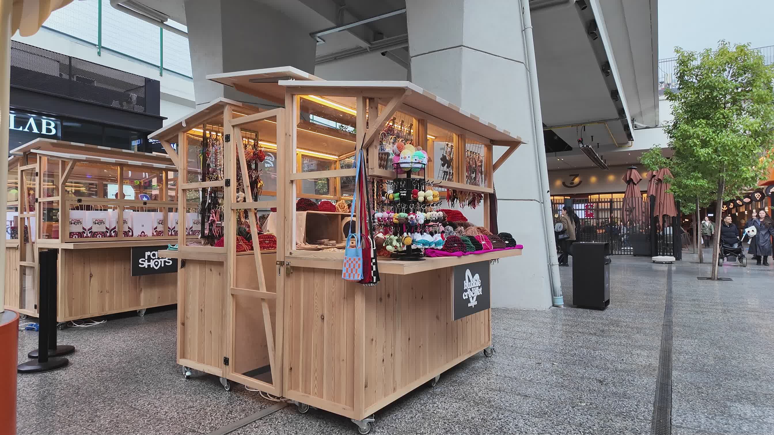 Charming Outdoor Market Booth with Handmade Crafts Free Stock Video ...