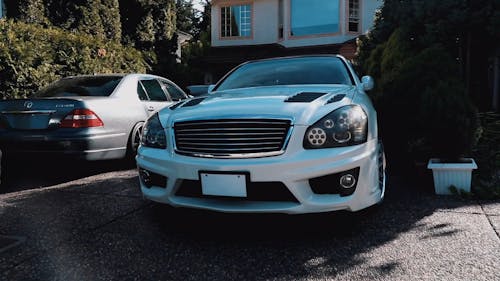 Private Cars Parked On A Driveway