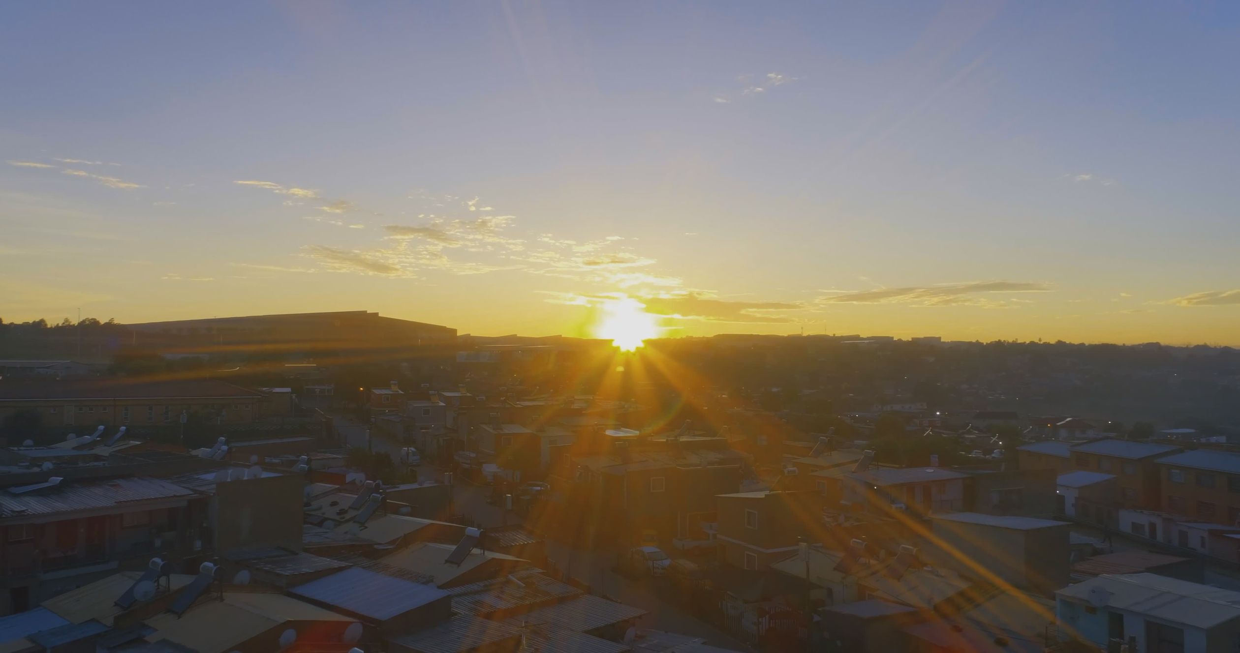Stunning Aerial View of Sunrise Over a Cityscape Free Stock Video ...