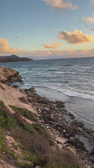 Women Manifest Success's ocean waves sunset video