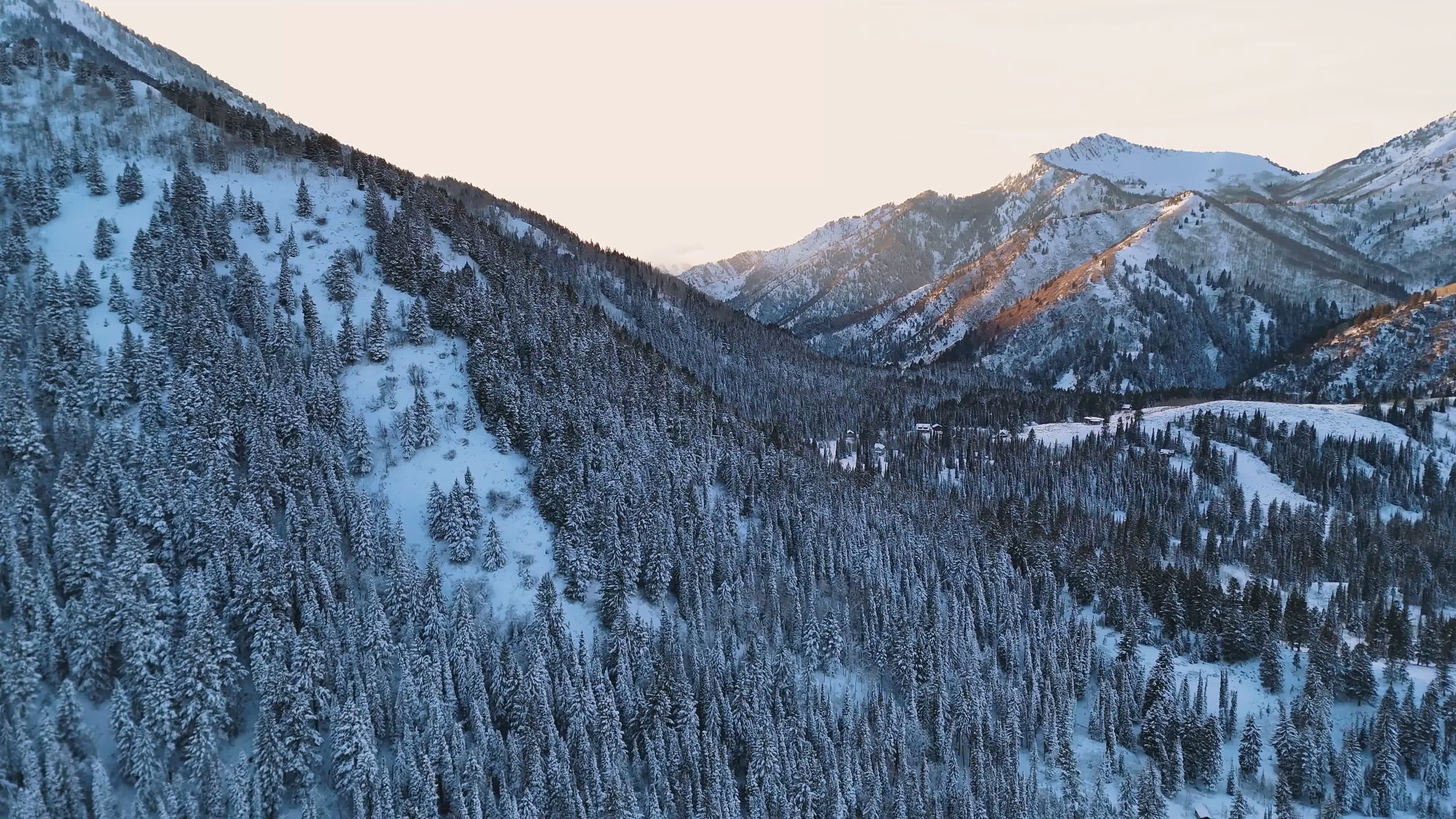 Aerial View of Snowy Mountain Valley at Sunrise Free Stock Video ...