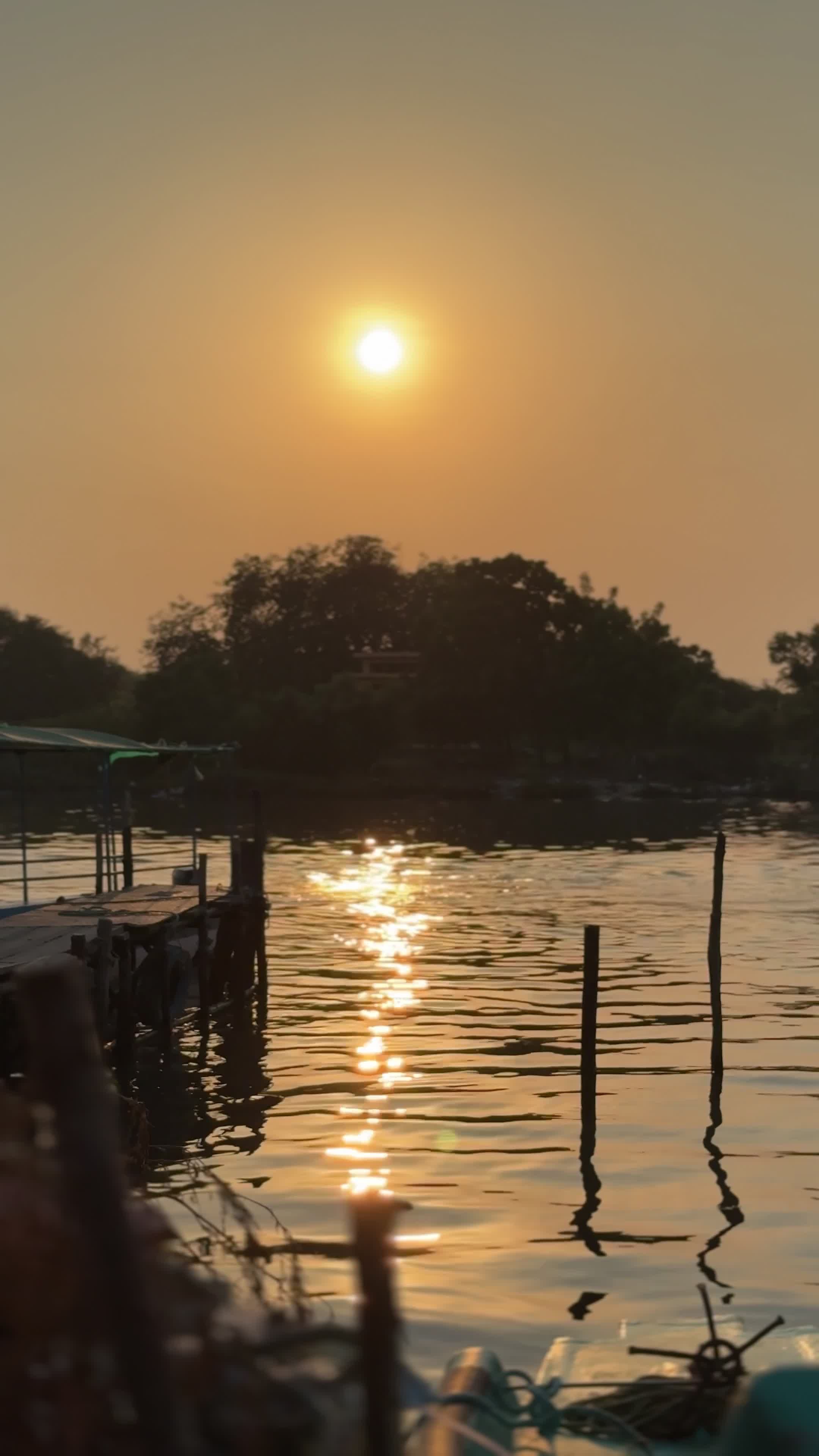 serene sunset over tranquil lake view 35623343
