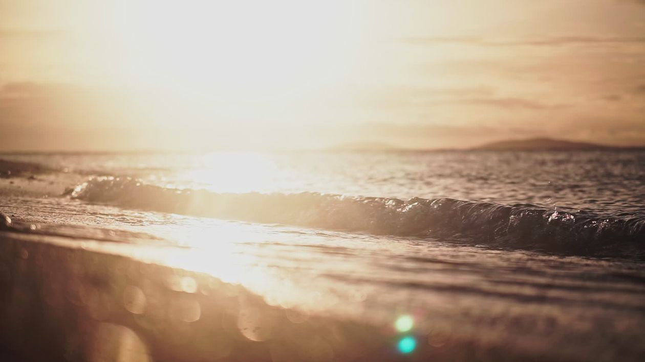 Tranquil Sunset Waves on a Peaceful Beach Free Stock Video Footage ...