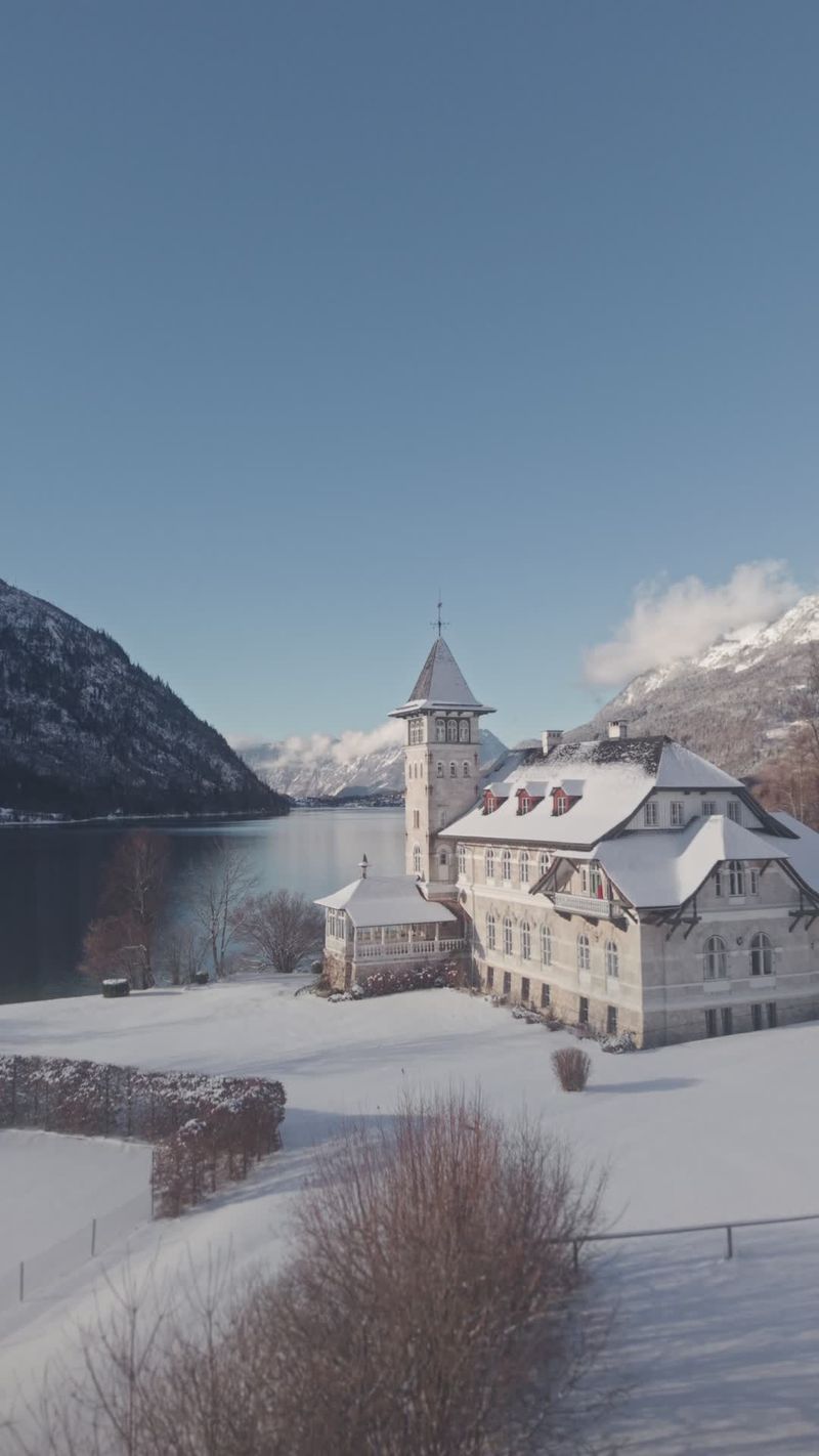 Scenic winter lake with snowy castle
