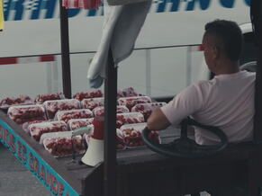 street vendor selling fresh strawberries