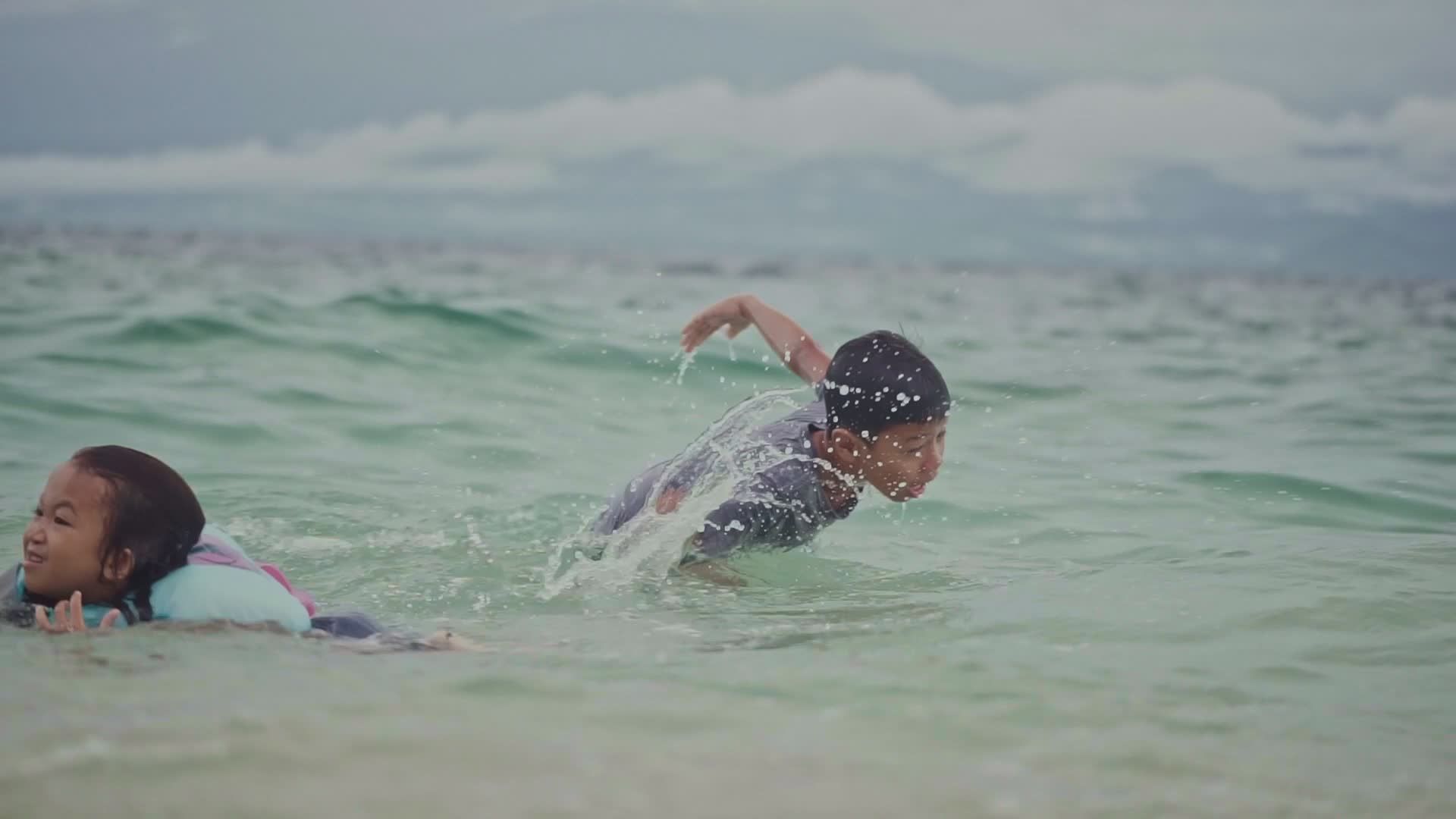 Children Playing in the Ocean Waves Free Stock Video Footage, Royalty ...