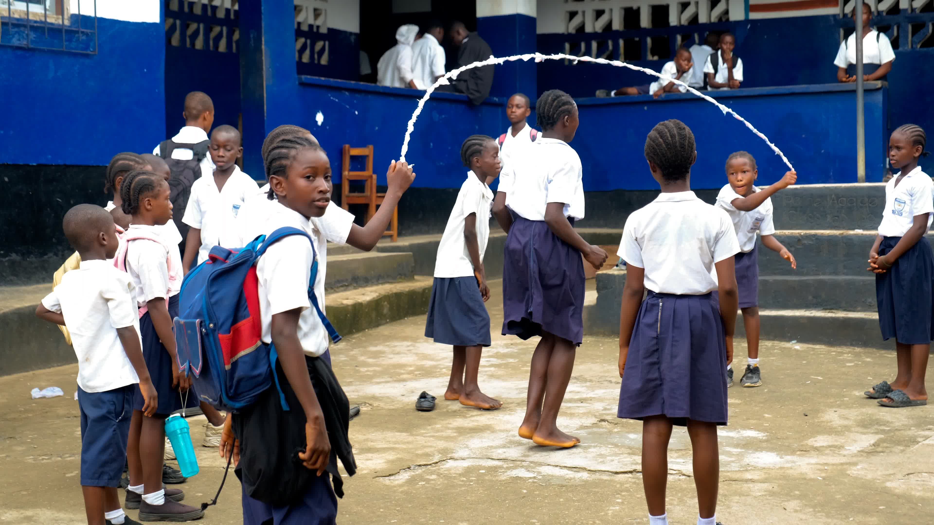 Children Playing Jump Rope in School Courtyard Free Stock Video Footage ...