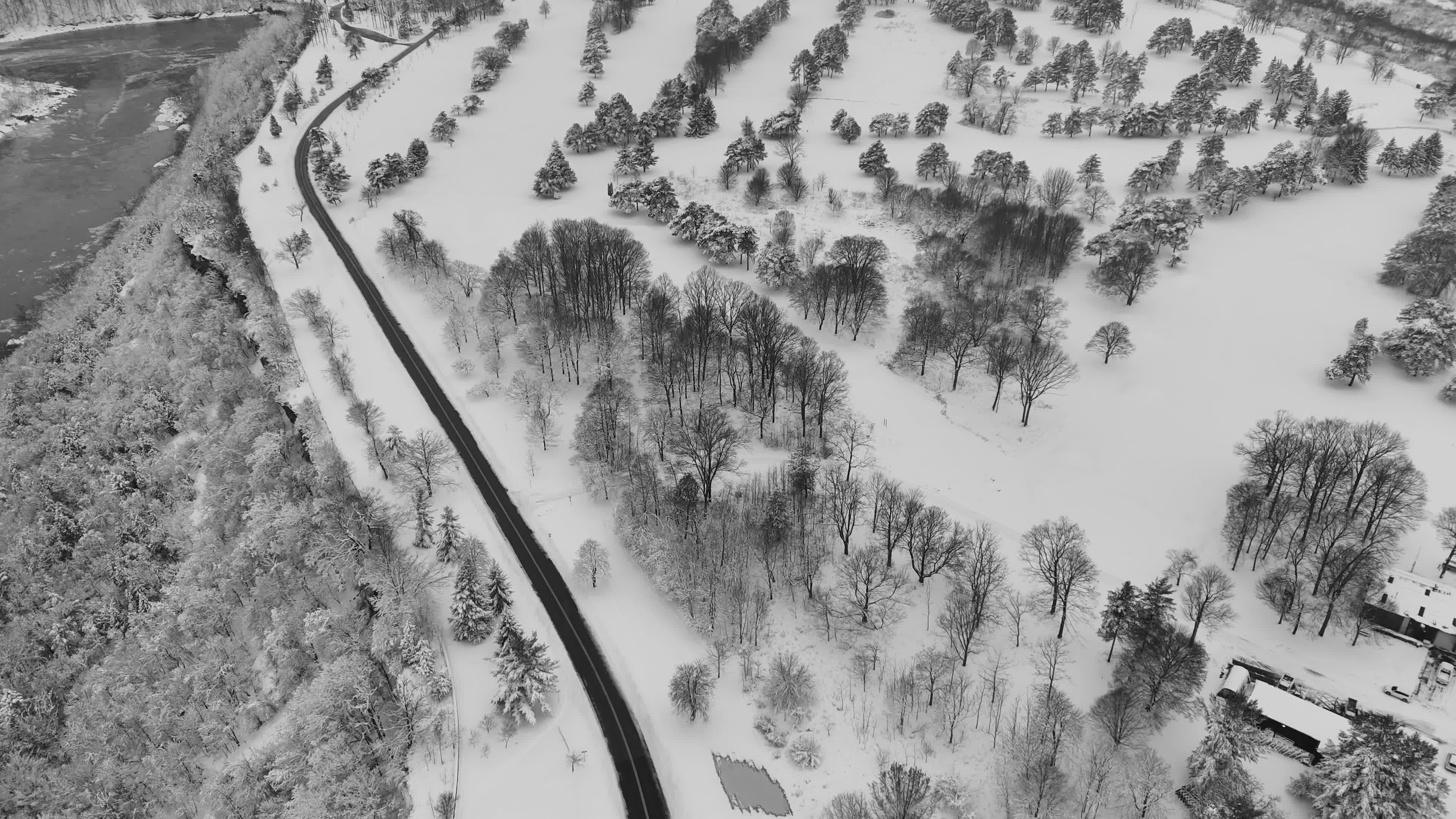 Aerial Winter Landscape with Snowy Road and Trees Free Stock Video ...