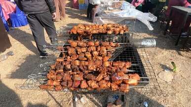 outdoor barbecue at lively market event