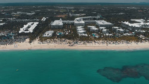 A Resort And Hotel Built In Front Of The Beach 