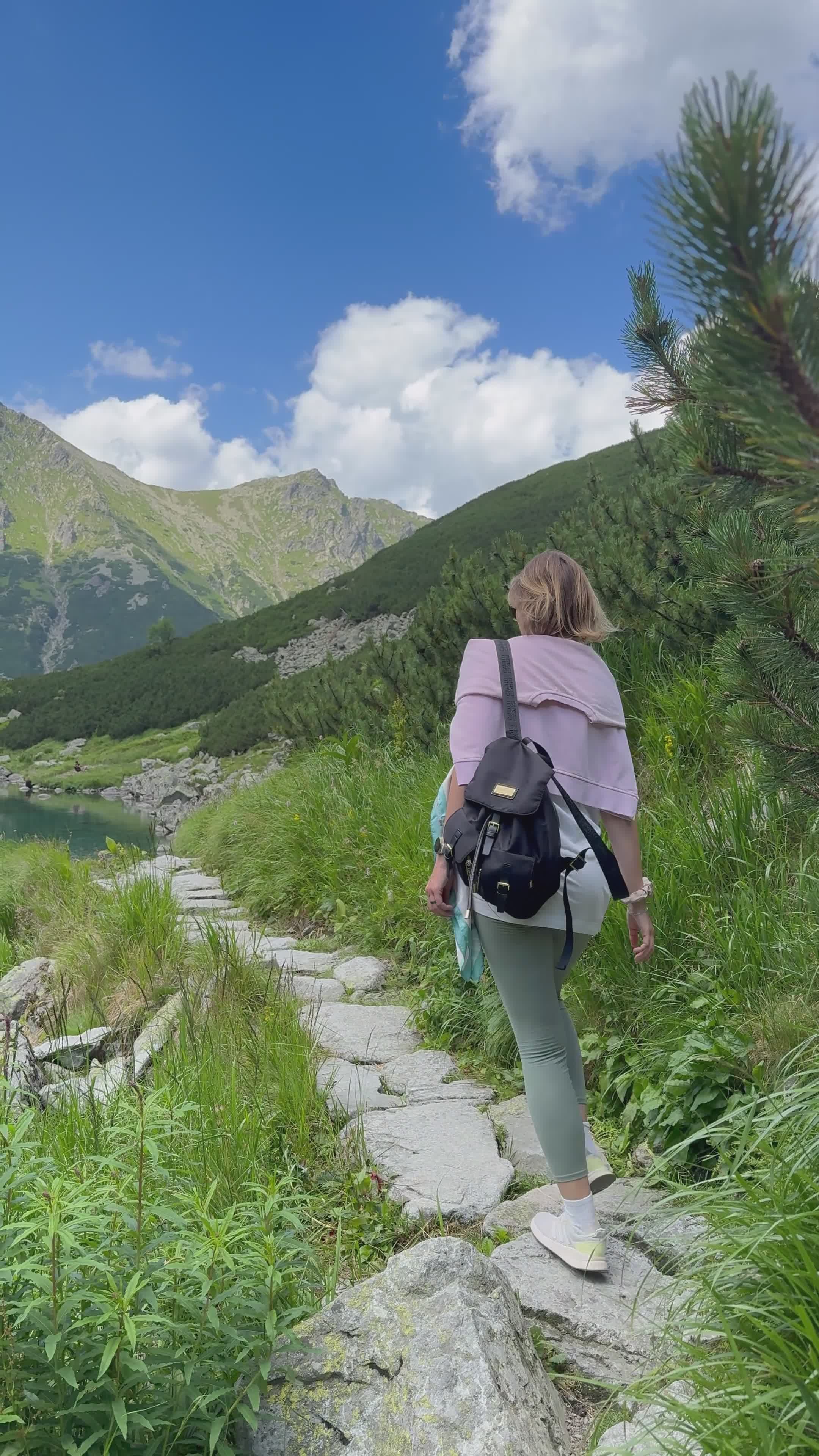 scenic mountain hike along a blue lake 35768976