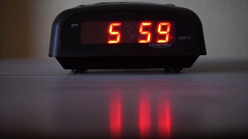 A Digital Alarm Clock Displaying Time