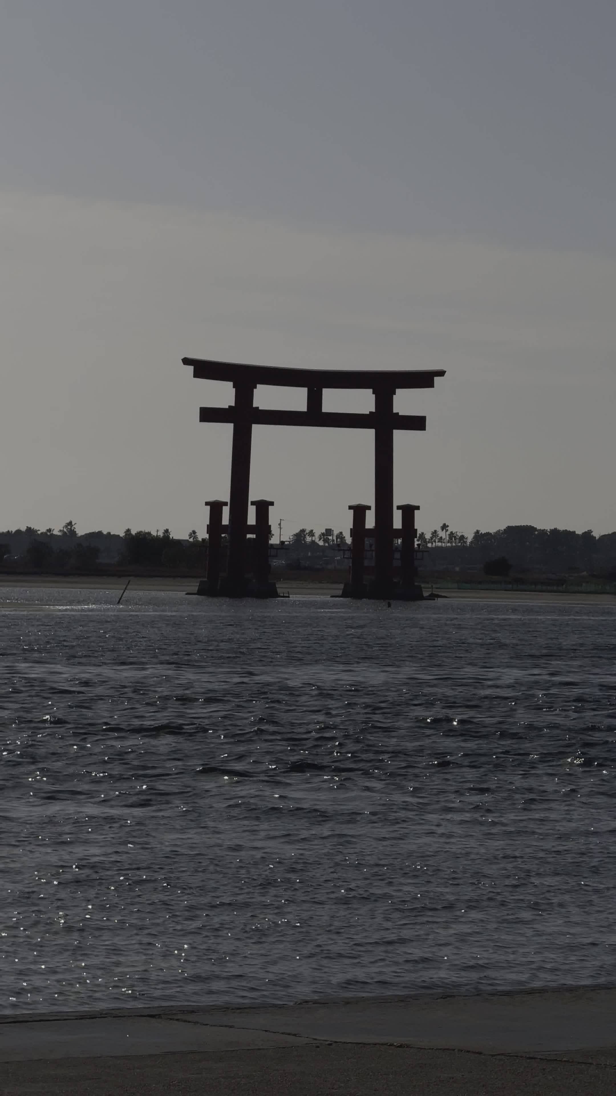 Silhouette of Torii Gate at Sunset over Water Free Stock Video Footage ...