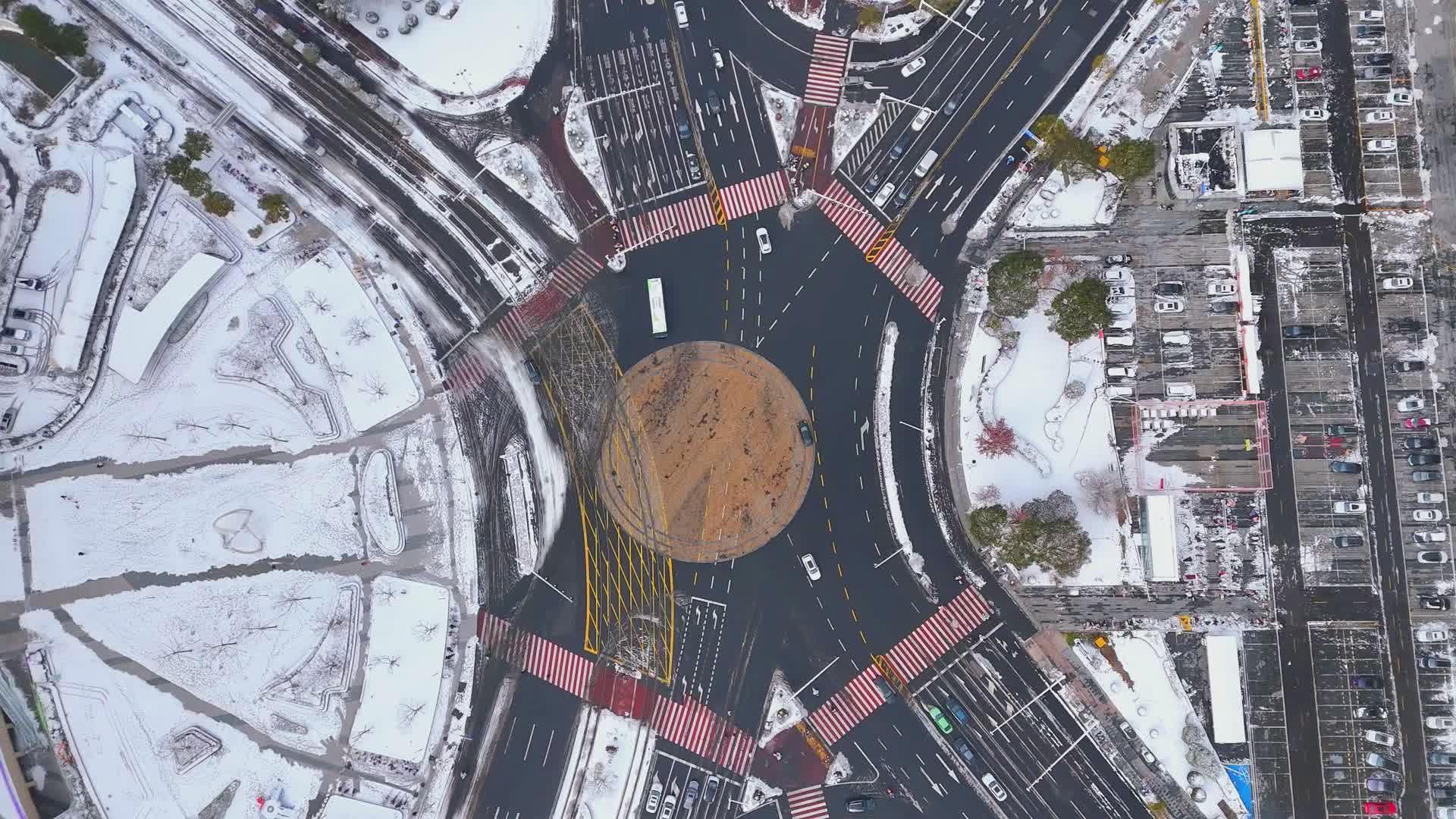 Aerial View of Snowy Urban Roundabout in Winter Free Stock Video ...