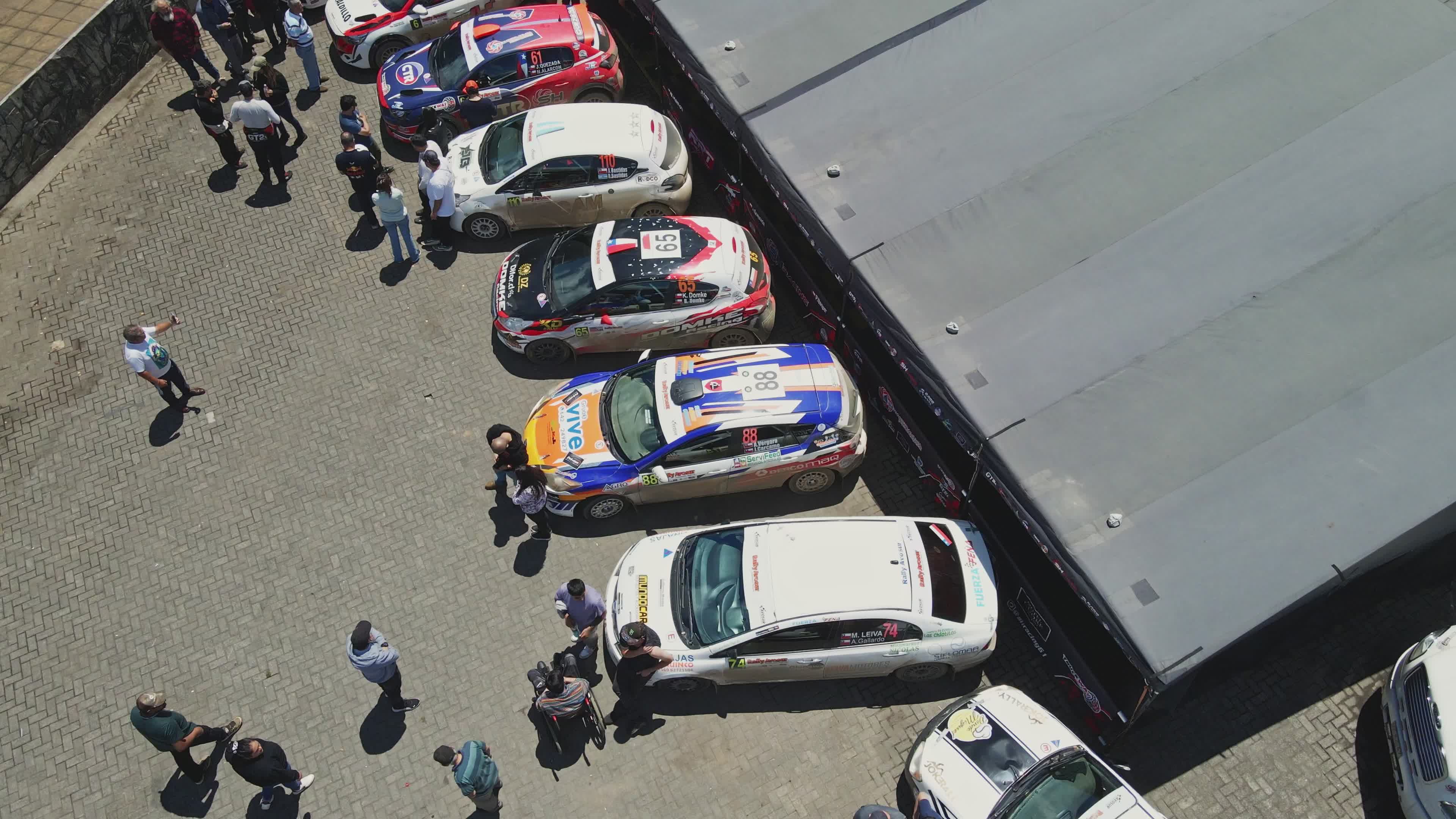 Aerial View of Rally Cars and Crowds Gathering Free Stock Video Footage ...