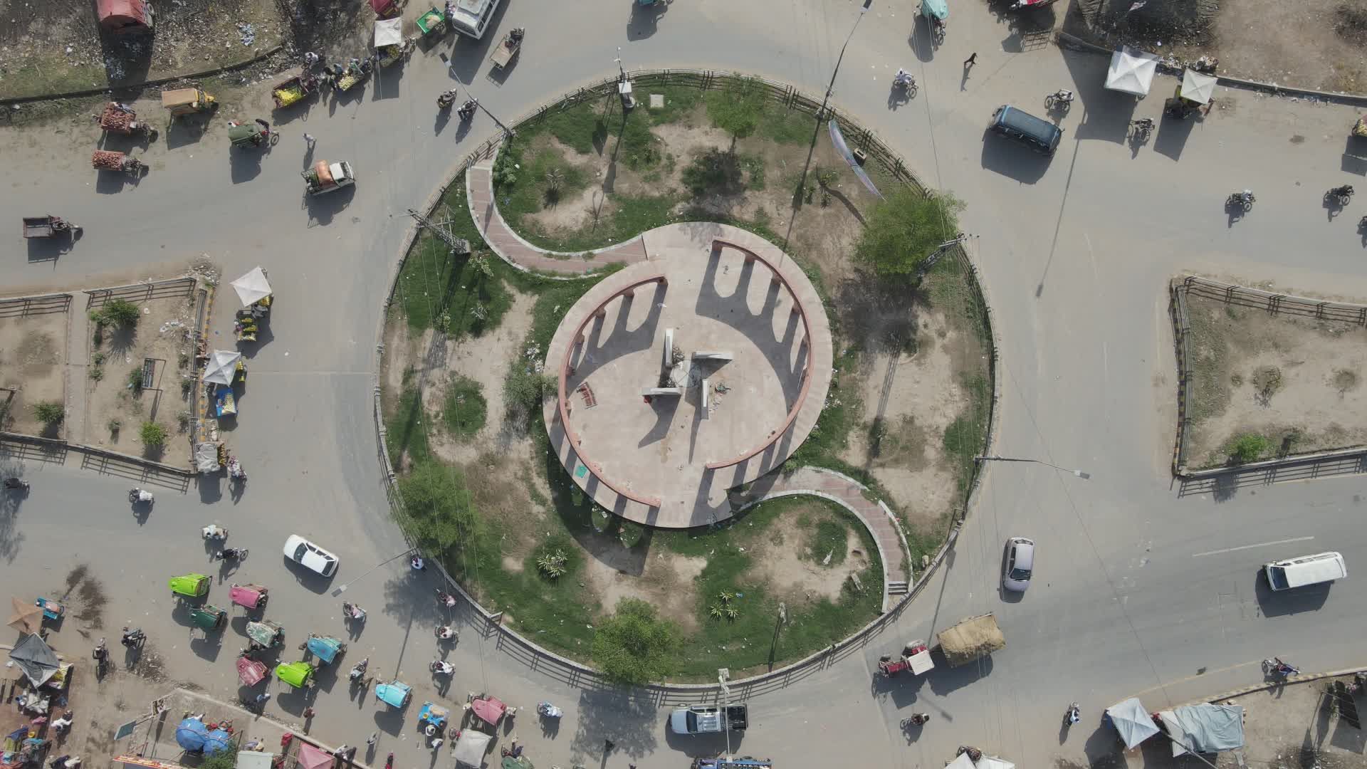 Aerial View of Busy Urban Roundabout and Surroundings Free Stock Video ...