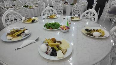 elegant banquet table setting with appetizers