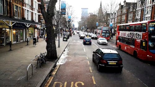 Travelling By Bus In The Street Of London