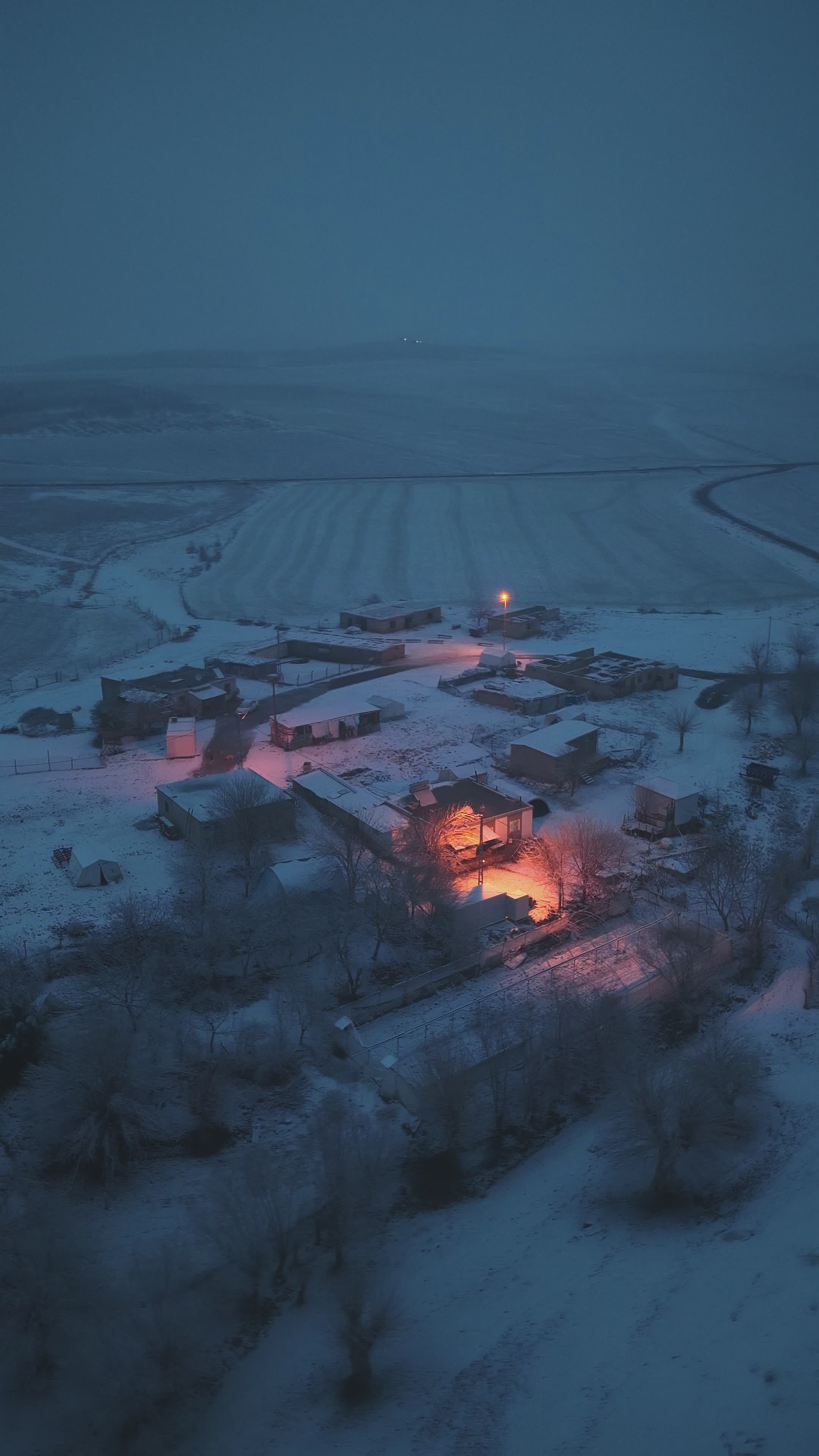Aerial View of Snowy Village at Twilight Free Stock Video Footage ...