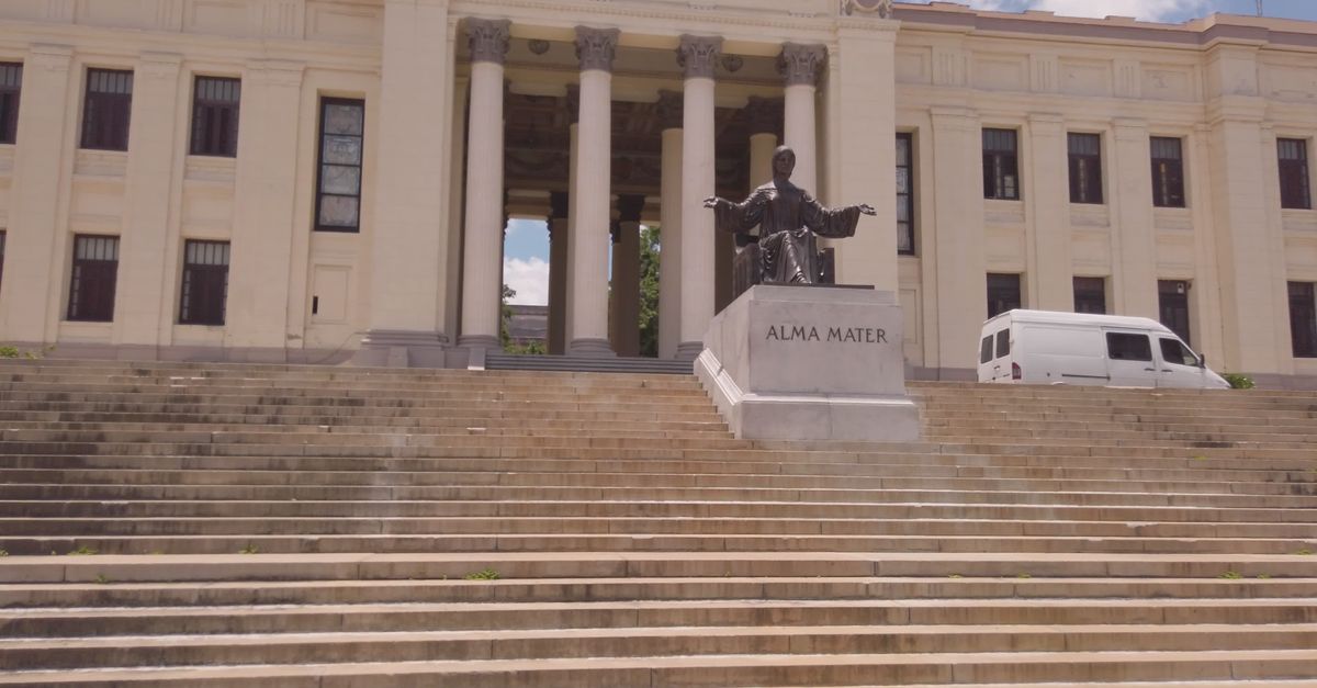 Historic University Entrance with Alma Mater Statue Free Stock Video