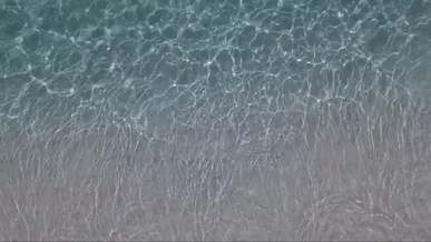 waves rushing to the seashore