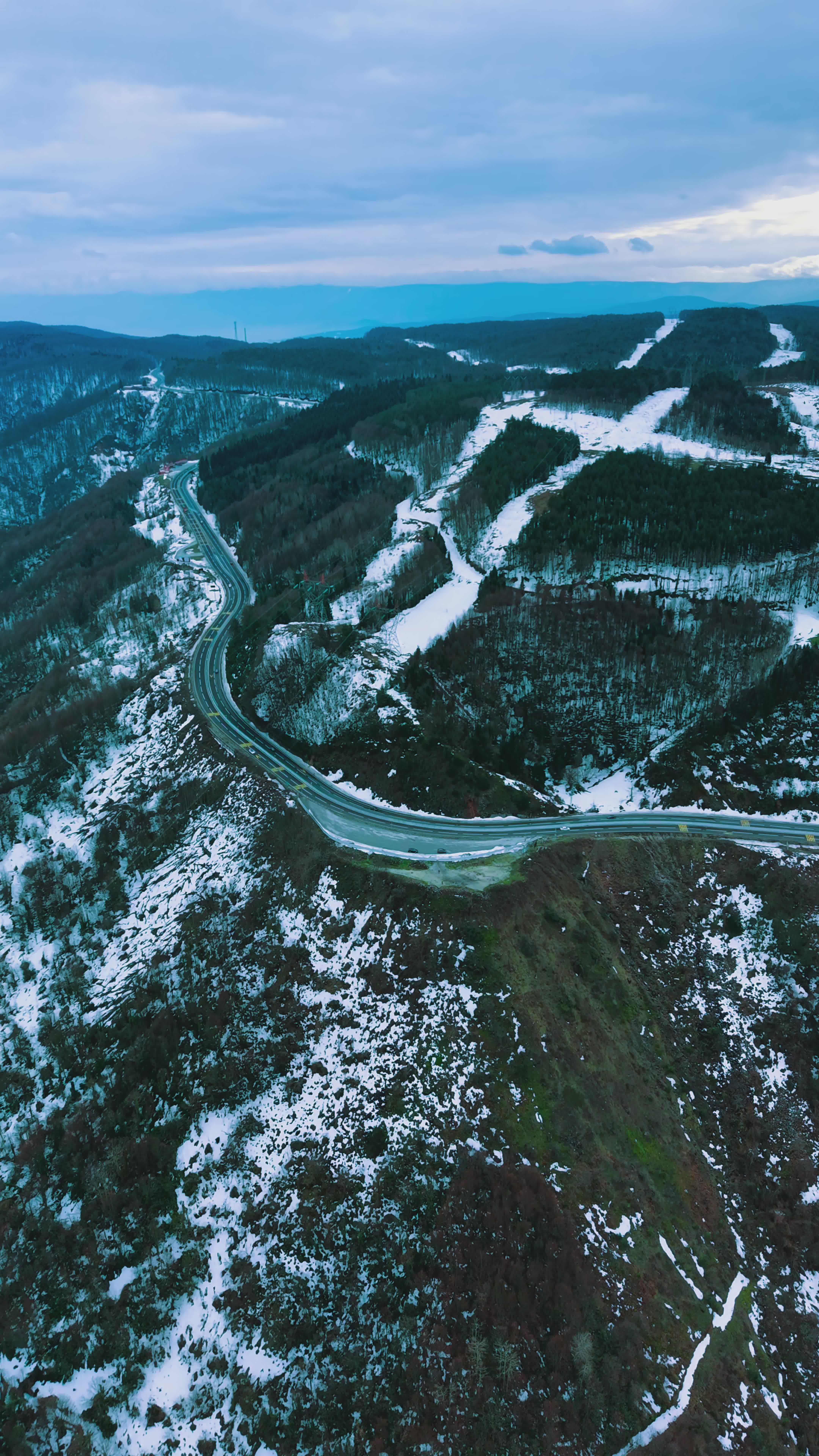 Aerial View of Snowy Mountain Roads in Winter Free Stock Video Footage ...