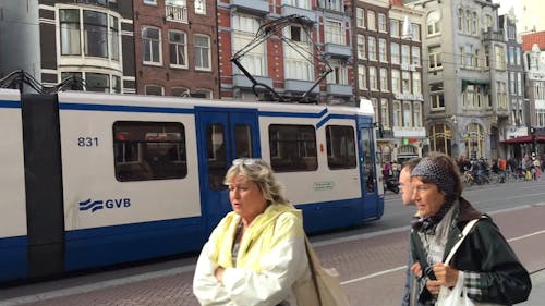 Electric Tram In Amsterdam Streets Used For Public Transportation